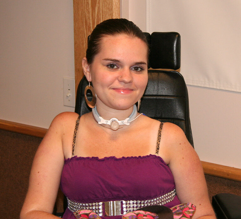 woman smiling in wheelchair