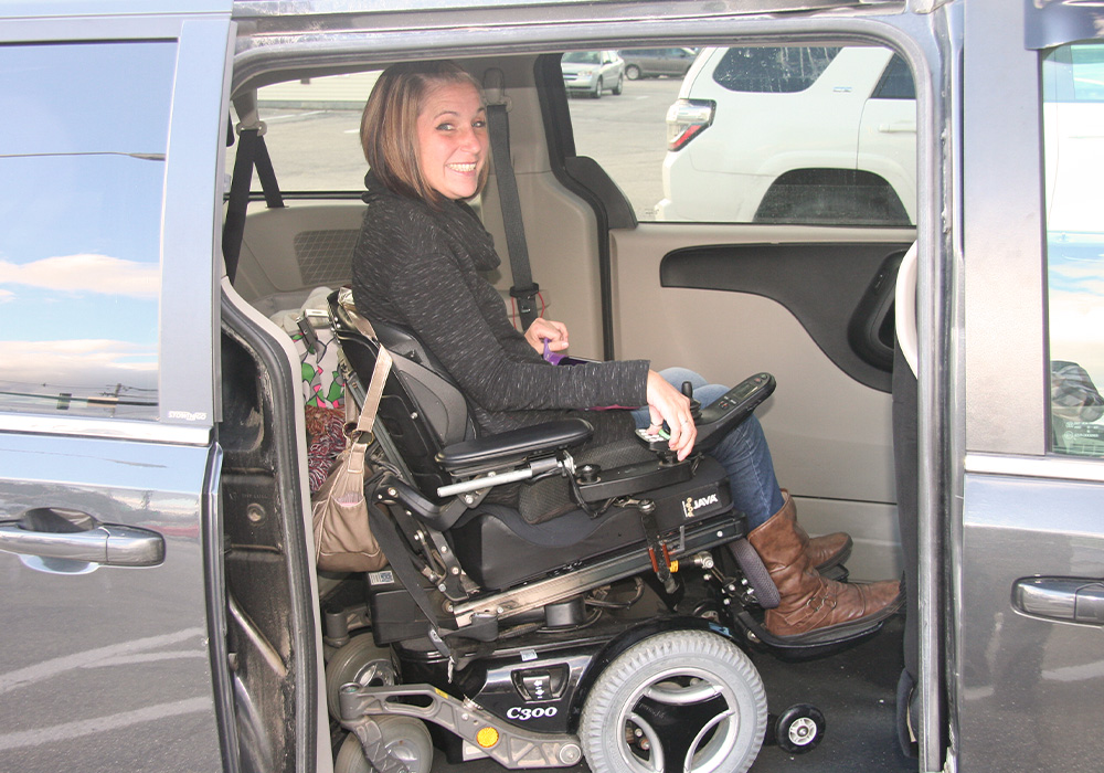 woman in wheelchair in handicapped van